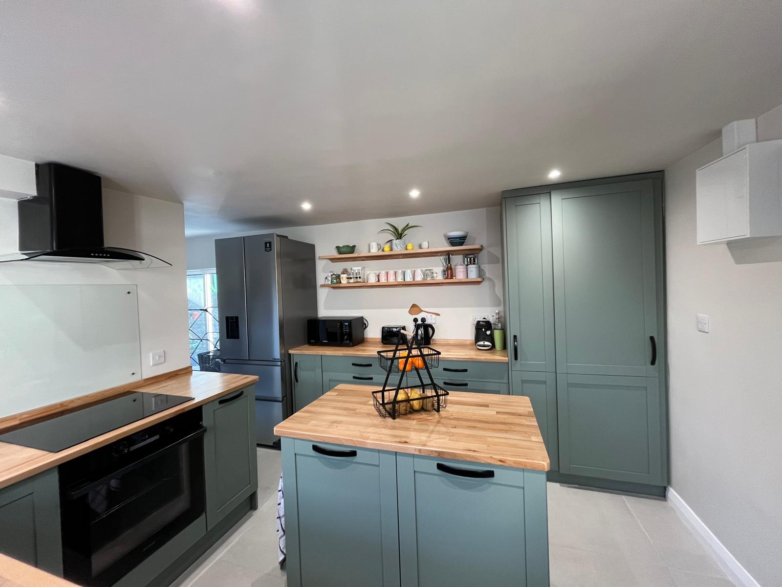Fitted kitchen units and tall storage completed as part of a renovation